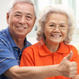 elderly couple smiling