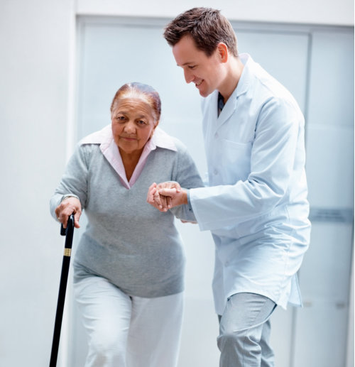 elderly man with a caregiver