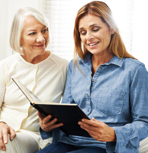 elderly woman and her daughter