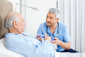 elderly man with his caregiver